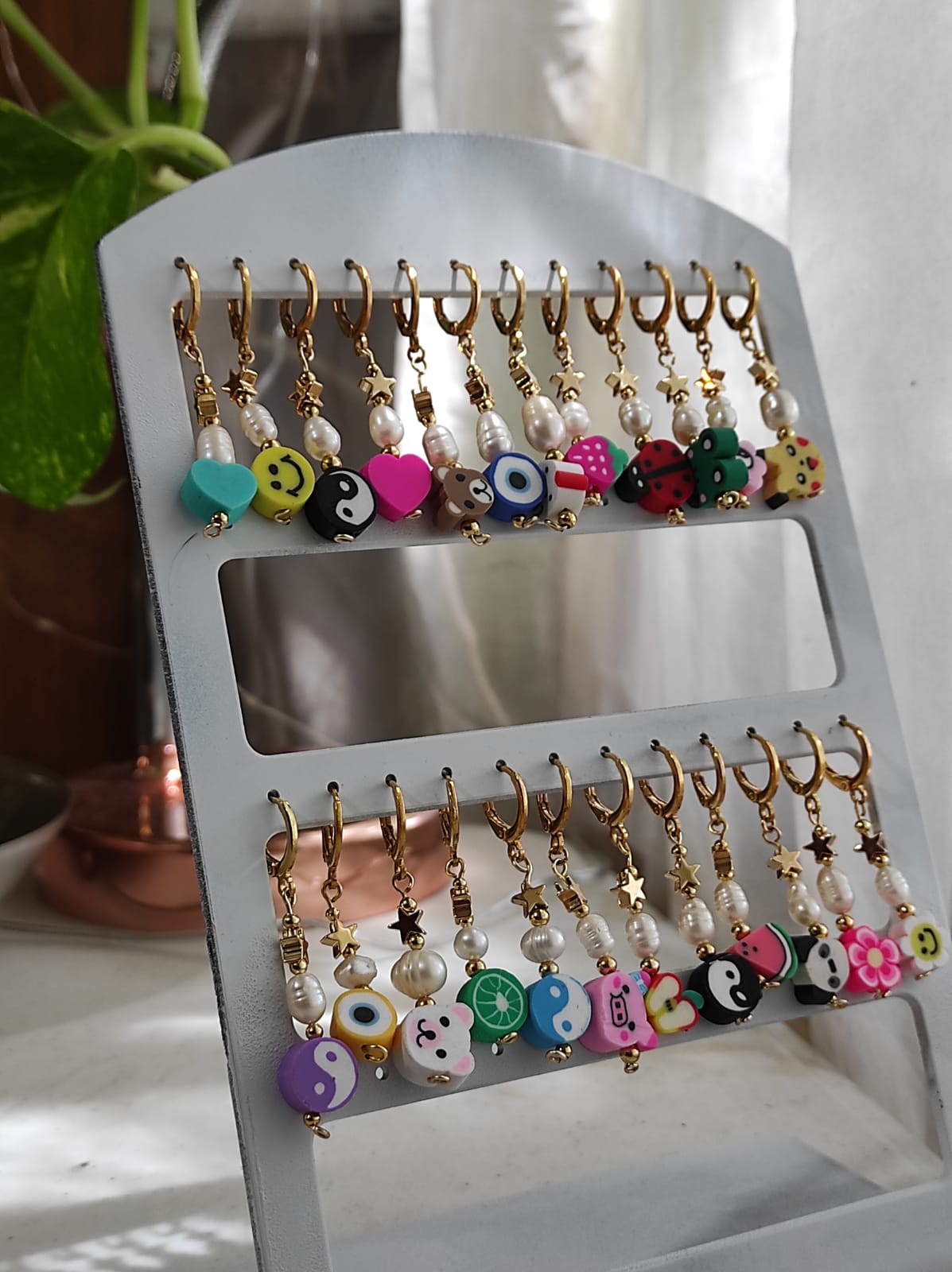 Huggies de fimo y perlitas