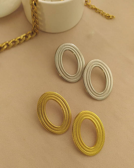 Aretes Mirror