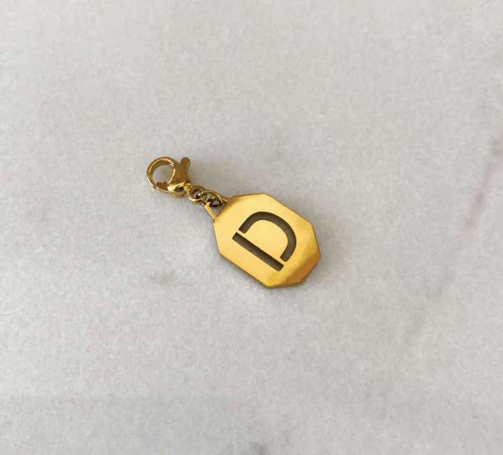Inicial charm