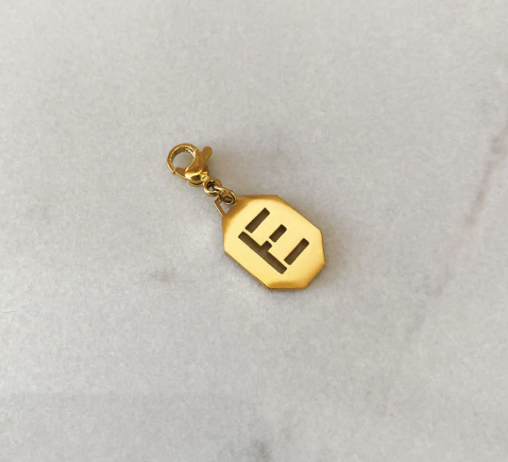 Inicial charm
