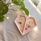 Huggies de fimo y perlitas