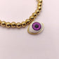 Pulsera balines y ojo realista
