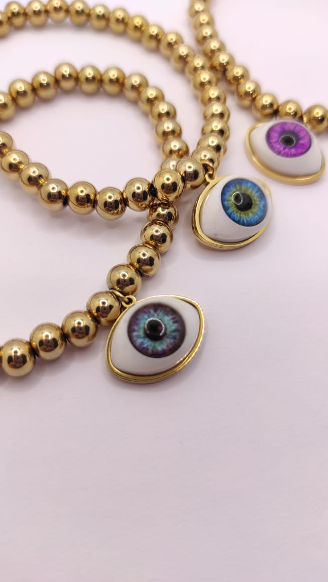 Pulsera balines y ojo realista