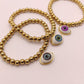 Pulsera balines y ojo realista