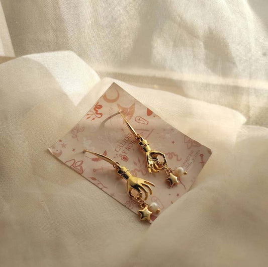 Aretes manos mágicas