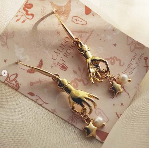 Aretes manos mágicas